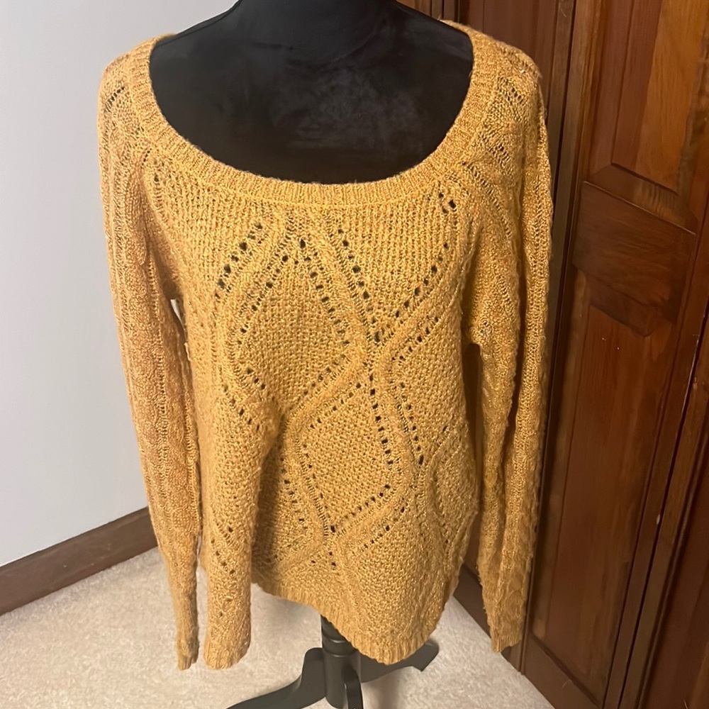 Yellow Maurice’s sweater